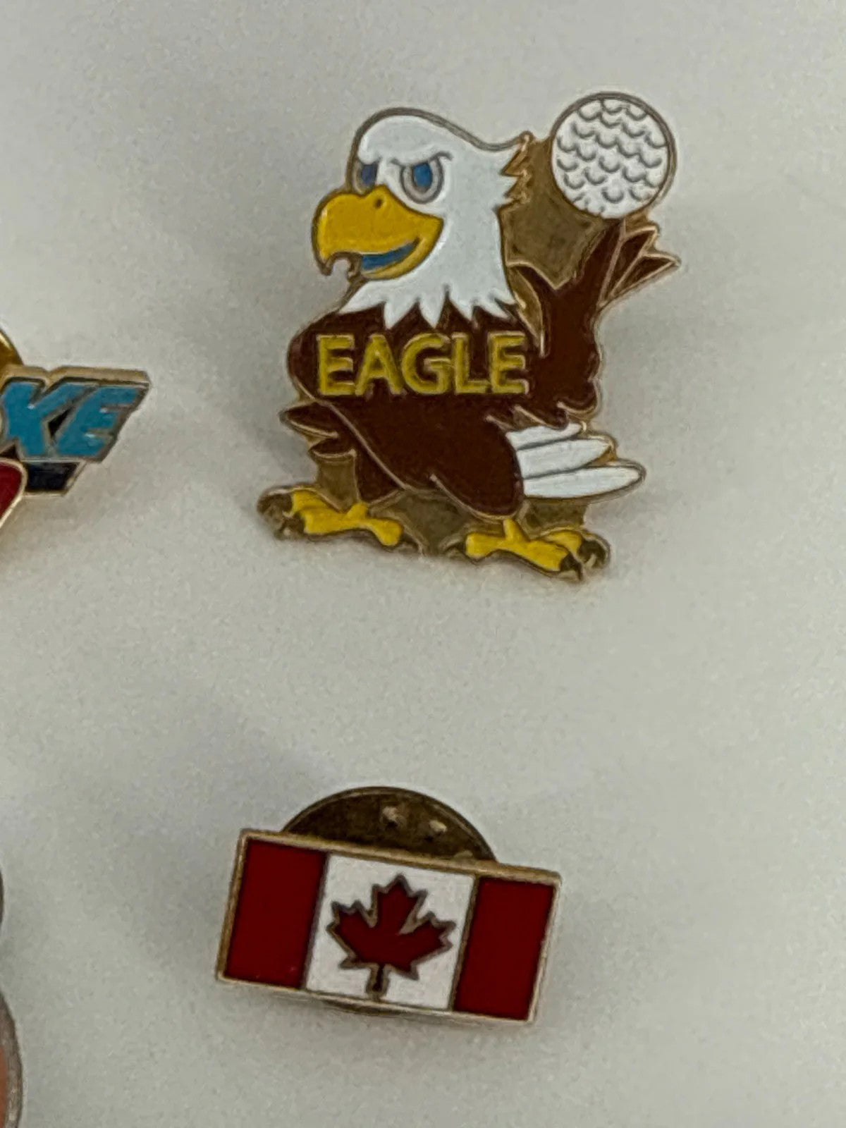 Lot of 9 Vintage Enamel Lapel Pins Hawaii Golf Canada Olympics Eagle Collectible